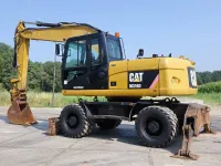 Pelle M316D CATERPILLAR à pneuswebp